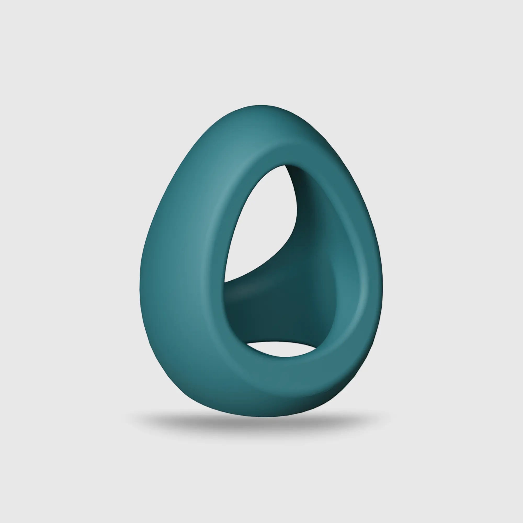 Double anneau pénien FLUX RING en silicone bleu, soulignant sa souplesse et sa couleur moderne