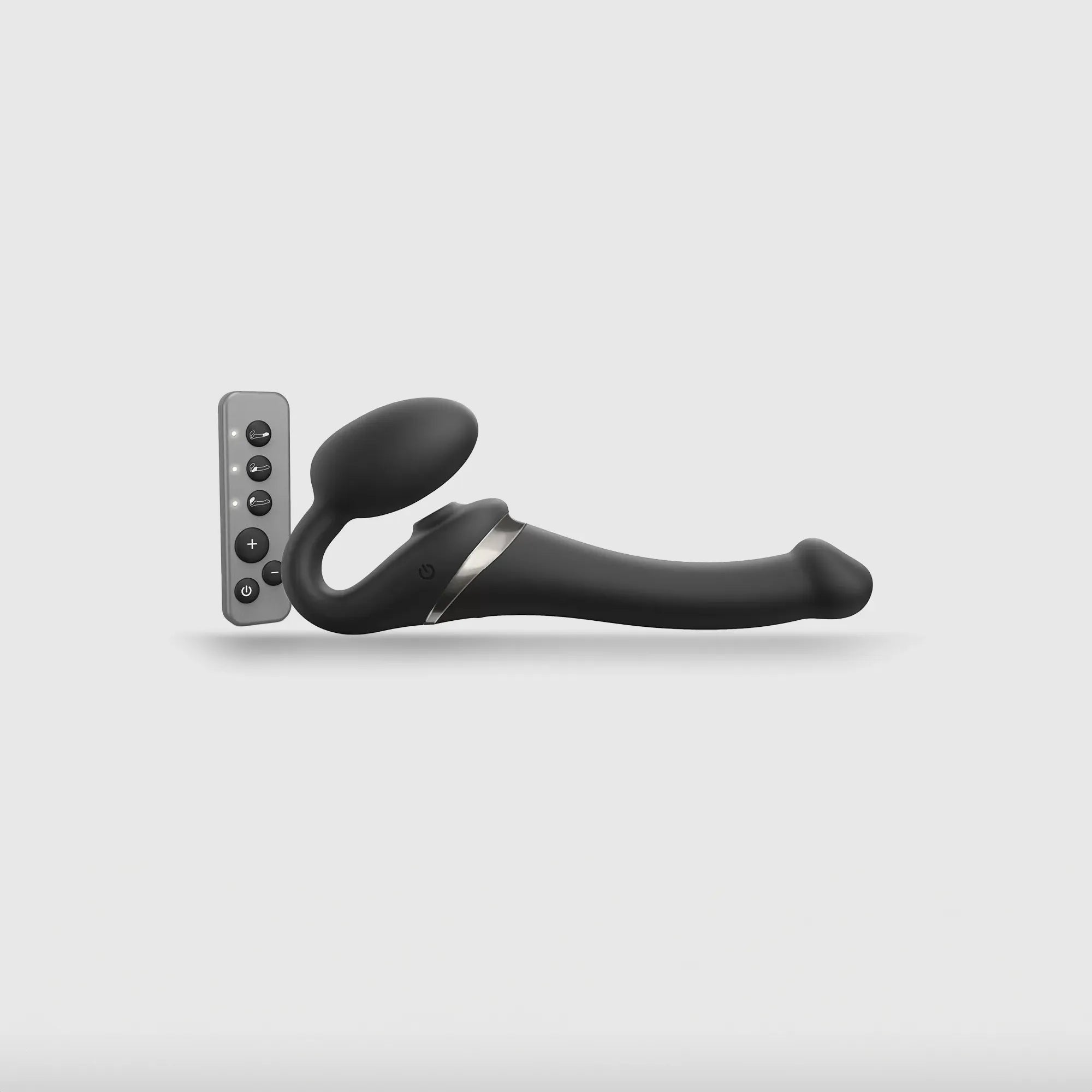 Gode ceinture télécommandé Multi Orgasm en noir, accompagné de sa télécommande intuitive