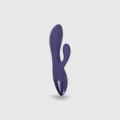 Vibromasseur rabbit flexible double stimulation Funky Bunny en silicone violet foncé avec finition métallisée, conçu pour stimuler simultanément le clitoris et le point G.