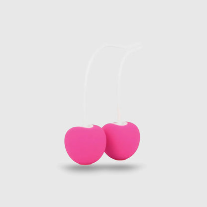 Boules de Geisha Cherry Love en silicone rose avec ficelle blanche pour renforcement du périnée