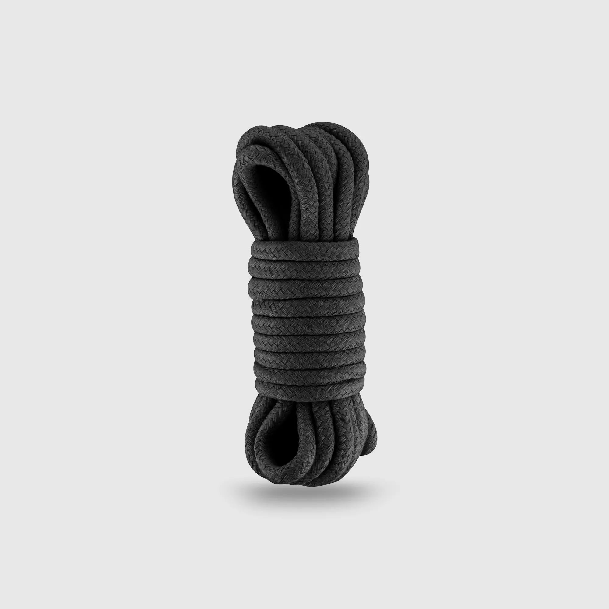 Corde SM bondage noire en coton de 5 mètres, idéale pour le Shibari et les jeux BDSM.