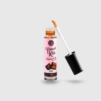 Gloss aphrodisiaque Vibrant Kiss saveur Brownie, bouchon noir et tube transparent