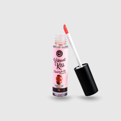 Gloss aphrodisiaque Vibrant Kiss saveur Strawberry Gum, révélant la teinte rouge sur l’applicateur