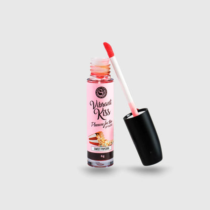 Gloss aphrodisiaque Vibrant Kiss saveur Sweet Popcorn, présenté avec embout rose